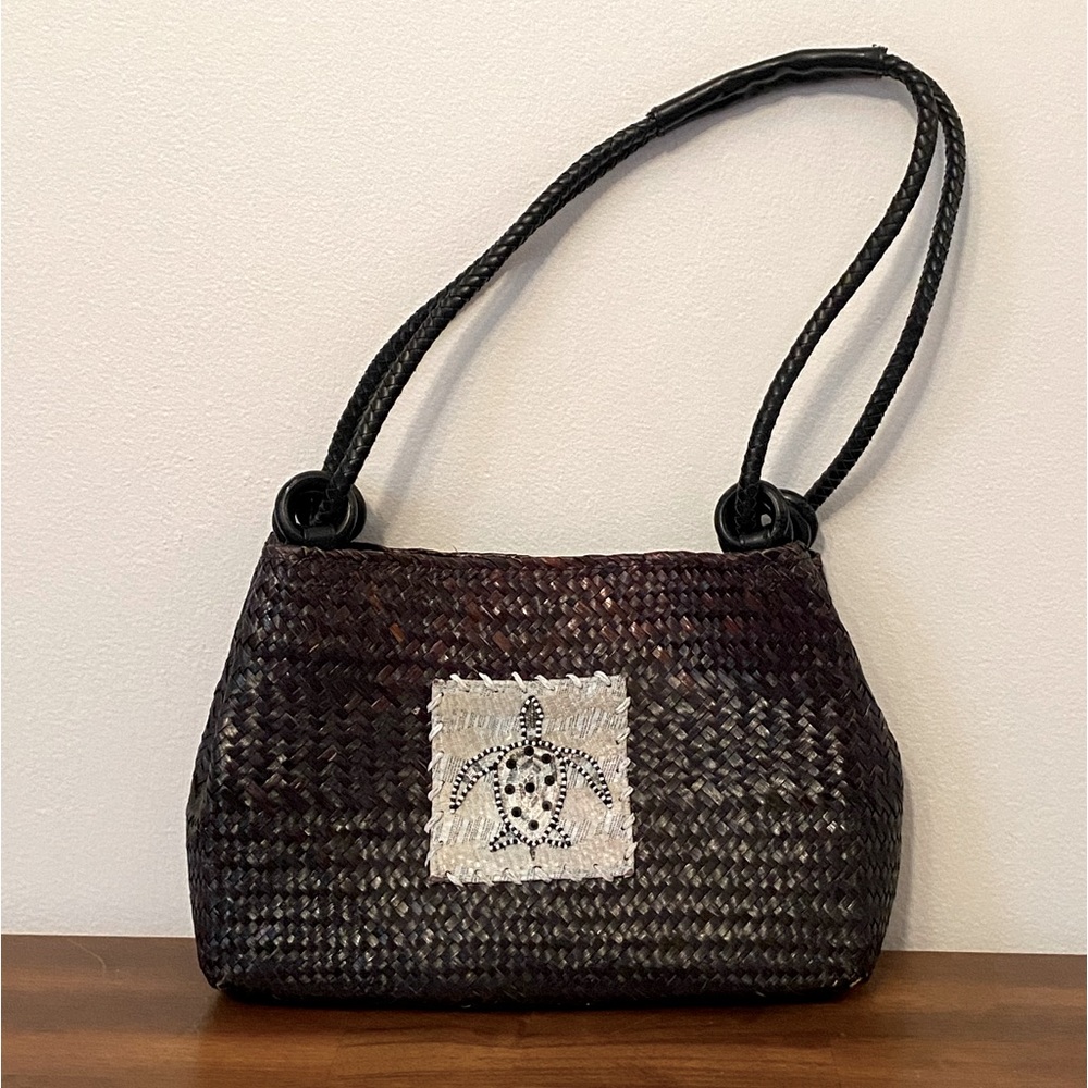 Elegant Black Woven Shoulder Bag with Turtle Motif